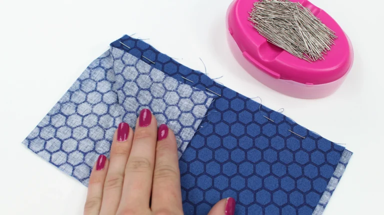 Pin the fabric with the wrong sides together for the French seam