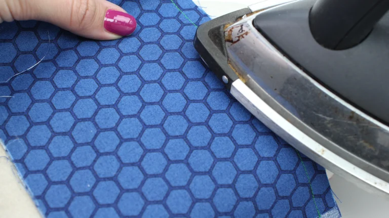 Press the first sewn seam flat