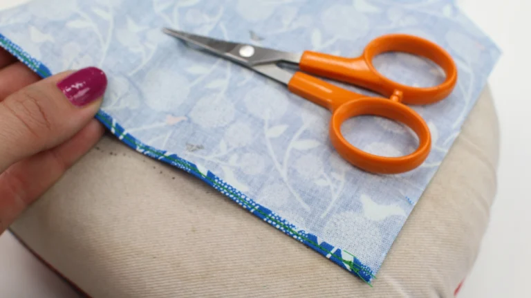 Trimmed rolled hem