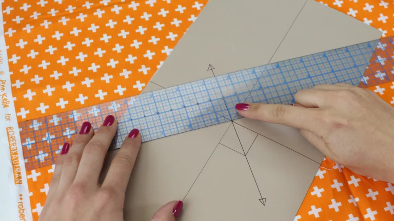 Measure the bias grainline of the pumpkin template onto the fabric