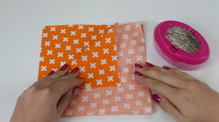 Align the two short edges of the fabric pumpkin pattern, right sides together
