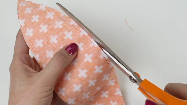 Trim the seam allowances of the pumpkin segments