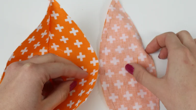 Match the two pumpkin segments sewn as pairs right sides together