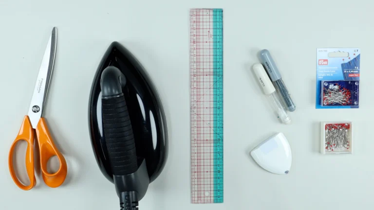 5 essential sewing tools for dressmaking - Fiskars scissors, iron, Clover ruler, chalk pen and Prym pins