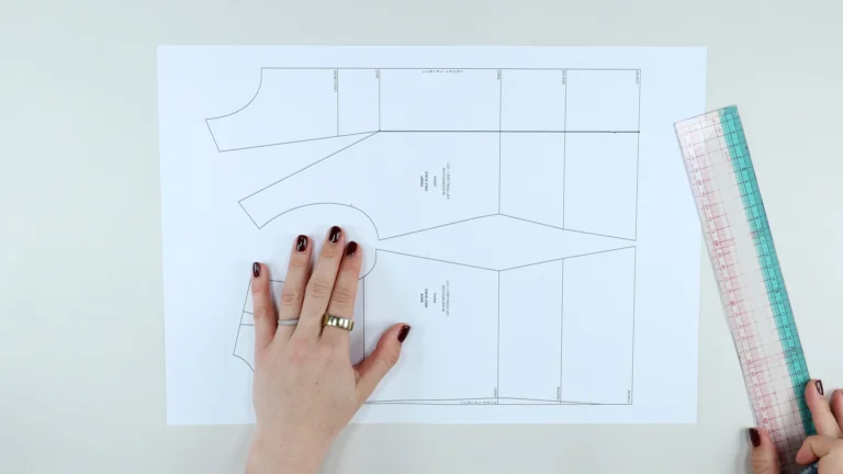 Drawing a dart placement line, from the bust apex on the front of the bodice block