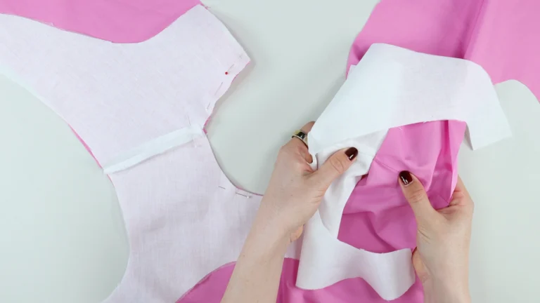 Checking the shoulder seams between the facing and the bodice will match
