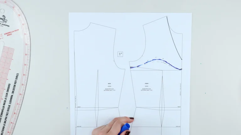 Bottom edge of all-in-one facing drawn on a lower V-neckline