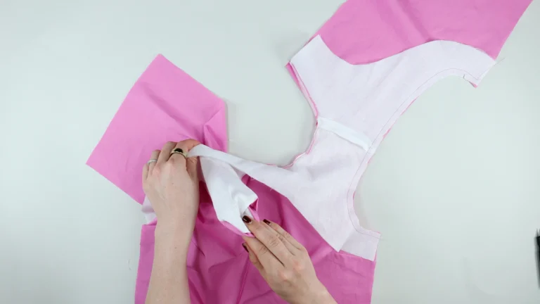 Pull the back of the garment through the shoulder with all-in-one facing and centre back seam