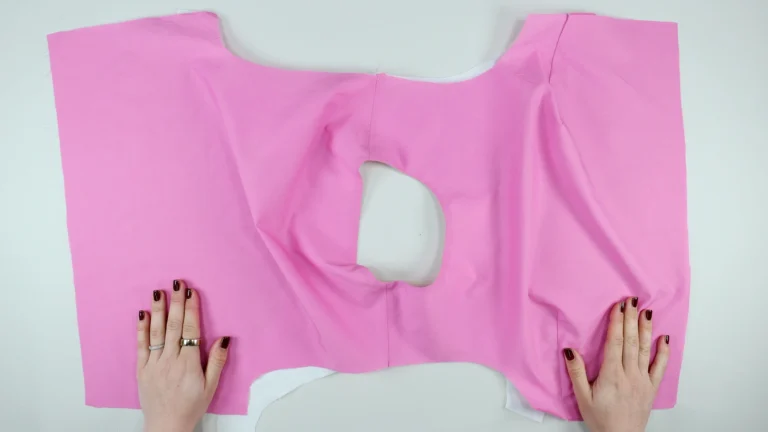All-in-one facing with centre back on fold, position garment with the right side of the outer material facing up