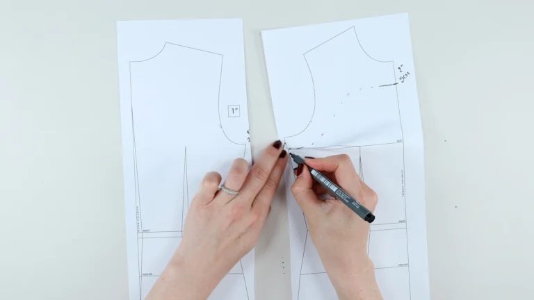 Fold the front side dart to draw in the bottom shape of the all-in-one facing