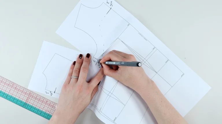 Matching the front and back patterns at the underarm to ensure a match between the all-in-one facing depths