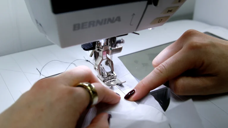 Sewing the final baby hem in silk georgette fabric
