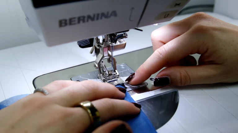 Using tissue paper underneath lightweight fabric at the sewing machine to stabilise when starting the seam