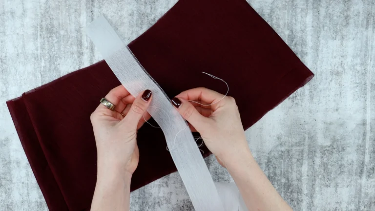 Loosen and remove warp threads from Ban-Rol interfacing