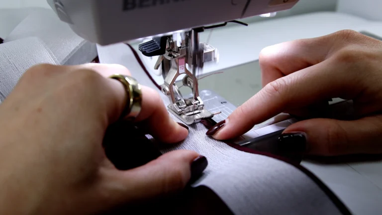 Stitching a Ban-Rol hem at the sewing machine 