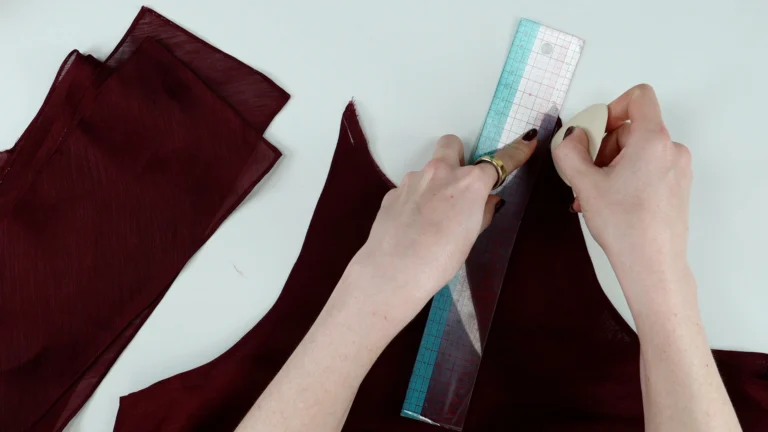 Mark the stitching line onto the neckline with chalk for the tie neck halterneck top