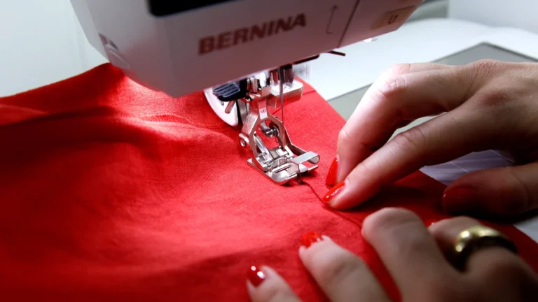 Edgestitch the top edge of the trouser hem at the sewing machine