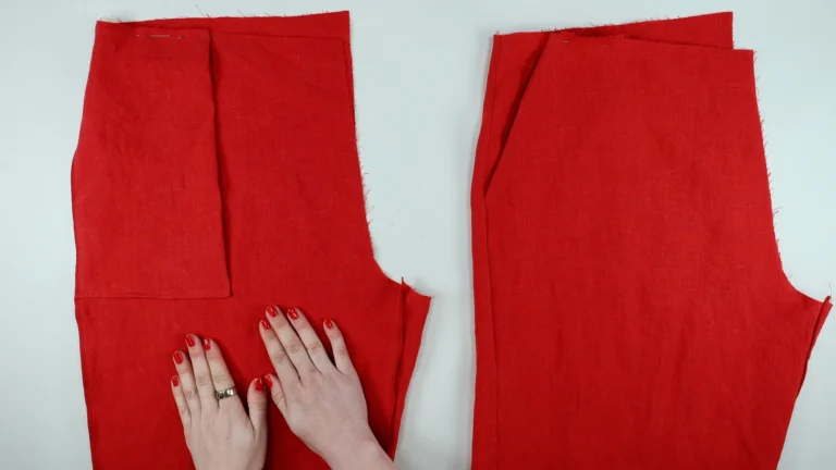 Trouser leg one right side out and one wrong side out, ready to sew the crotch seam